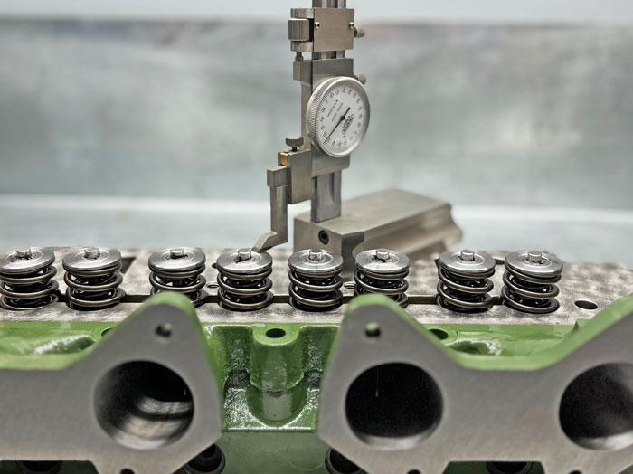 Remanufacturing Process - measuring the Cylinder Head.