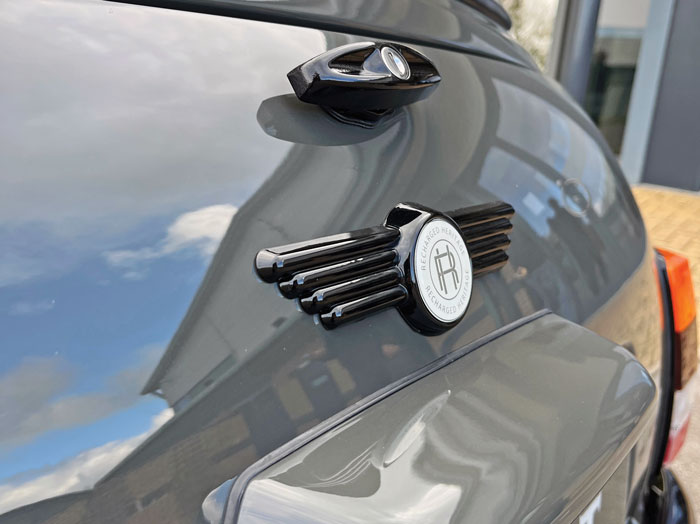 Custom rear badge on the Mini Spectre, completing its stealth-inspired design.