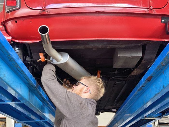 Mini Sport Exhaust Fitting in Garage